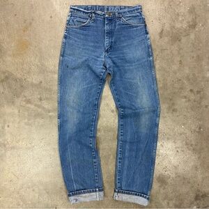 Vintage broken in Wrangler blue jeans